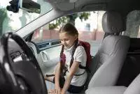 child-gets-in-car-for-contact-handover.jpg